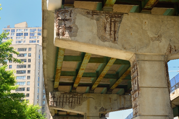 A broken bridge displays the crumbling infrastructure of the US.